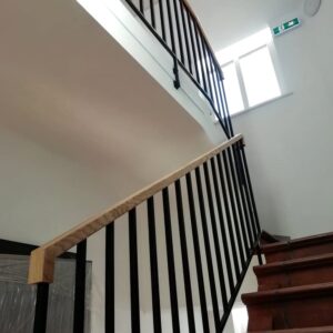 Internal staircase balustrade with wood