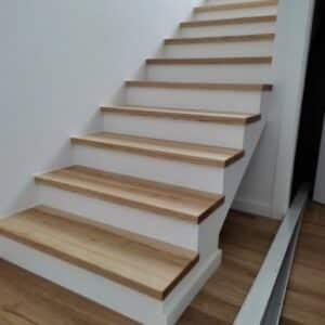 Wooden steps on concrete