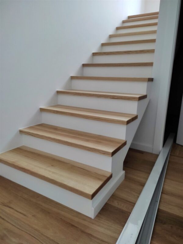 Wooden steps on concrete