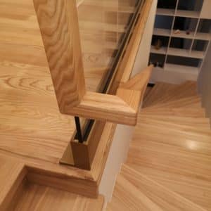 Wooden handrails on glass
