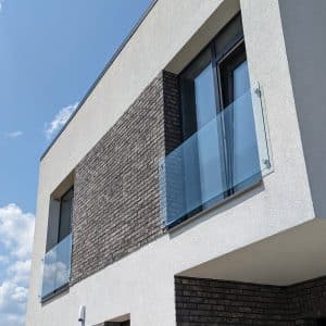 Frameless glass French balconies